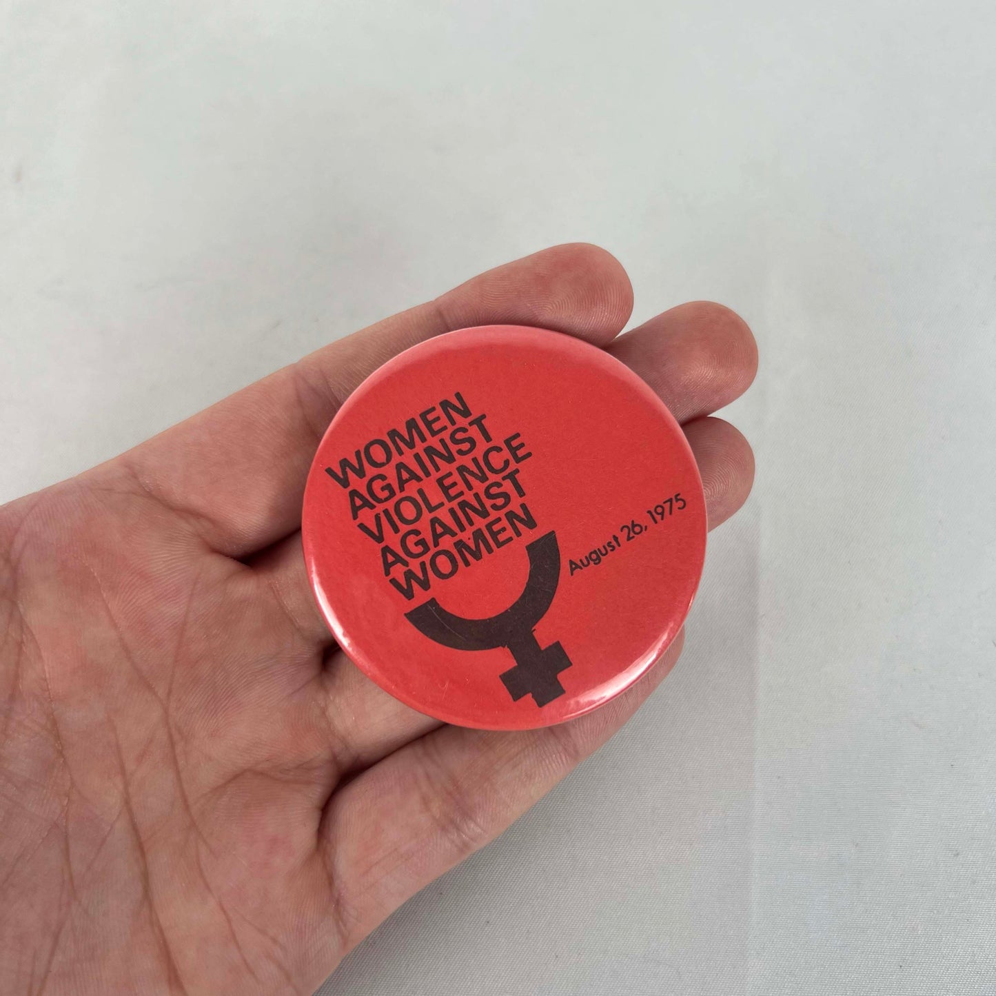 1975 Women Against Violence Against Women Pin