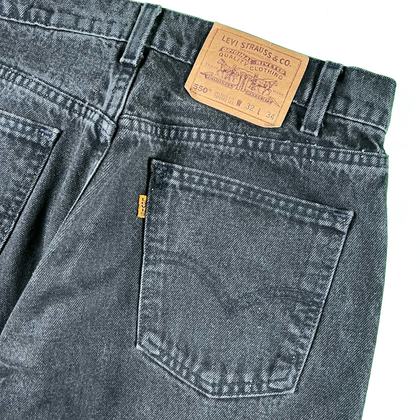 90s Faded Black Levi's 550 Orange Tabs- 31x34